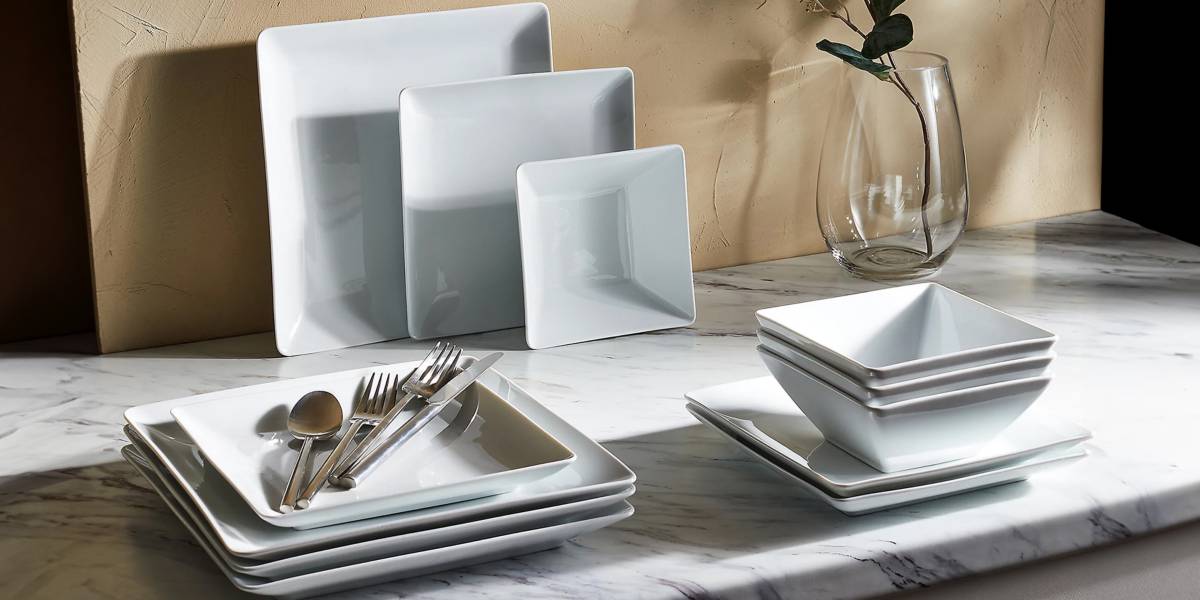 Square dinner set and silver-toned cutlery 